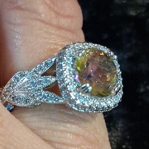 Ornate Silver Ring with Intricate Filigree and Accent Diamonds